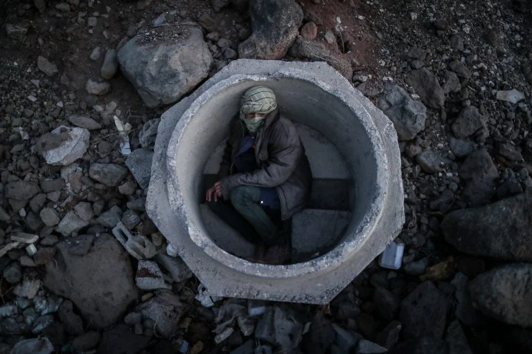 Escaping From Taliban: All or Nothing